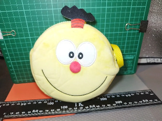 黃色大臉小包