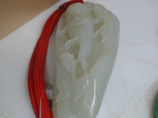 玉手把件